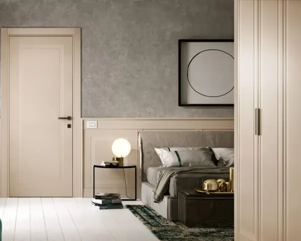 Une porte de chambre sobre et élégante, parfaite pour une idée déco minimaliste. Le bois clair et les lignes épurées s'harmonisent avec le reste de la pièce.