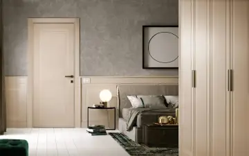 Une porte de chambre sobre et élégante, parfaite pour une idée déco minimaliste. Le bois clair et les lignes épurées s'harmonisent avec le reste de la pièce.
